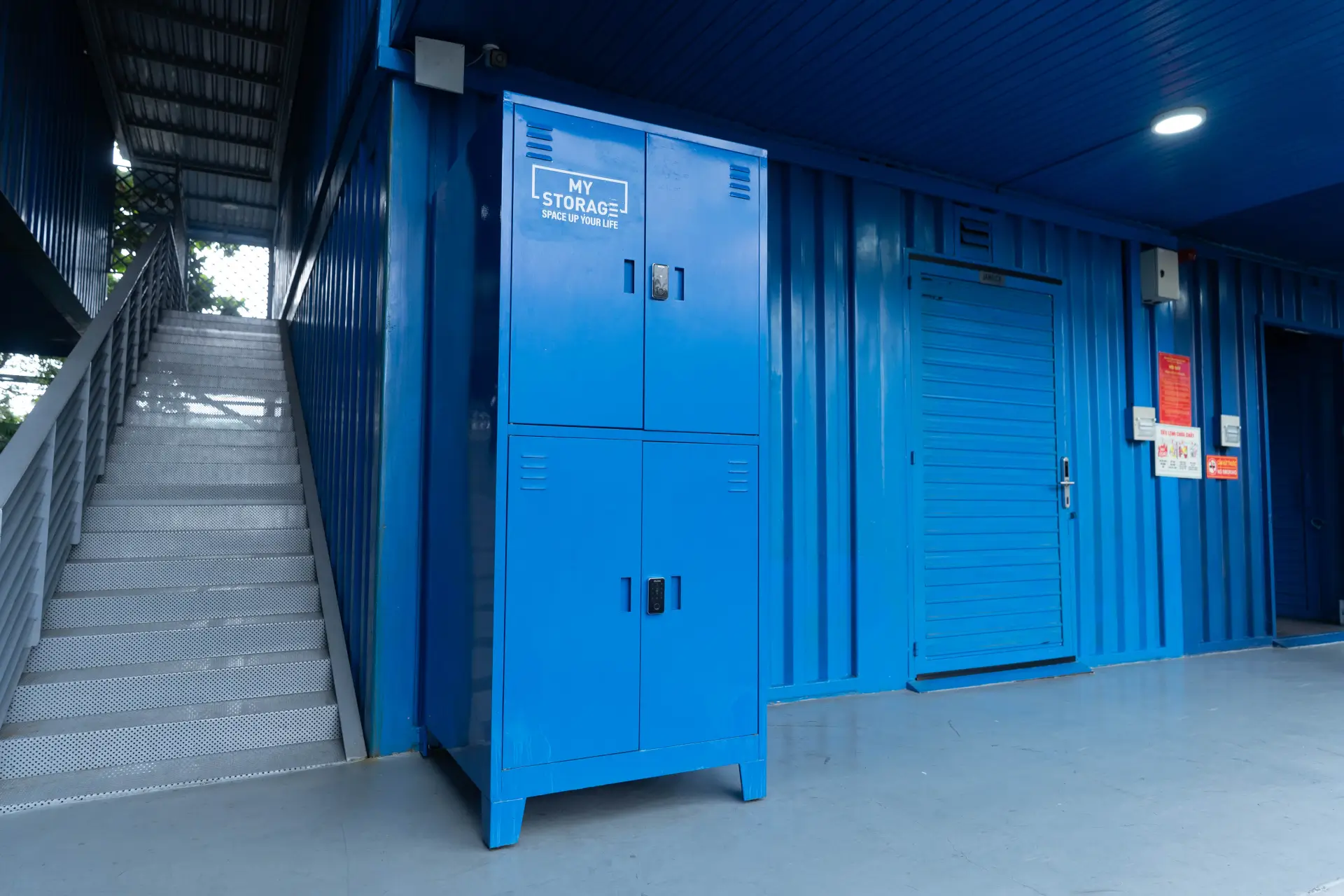 A MyStorage locker unit standing in a facility walkway