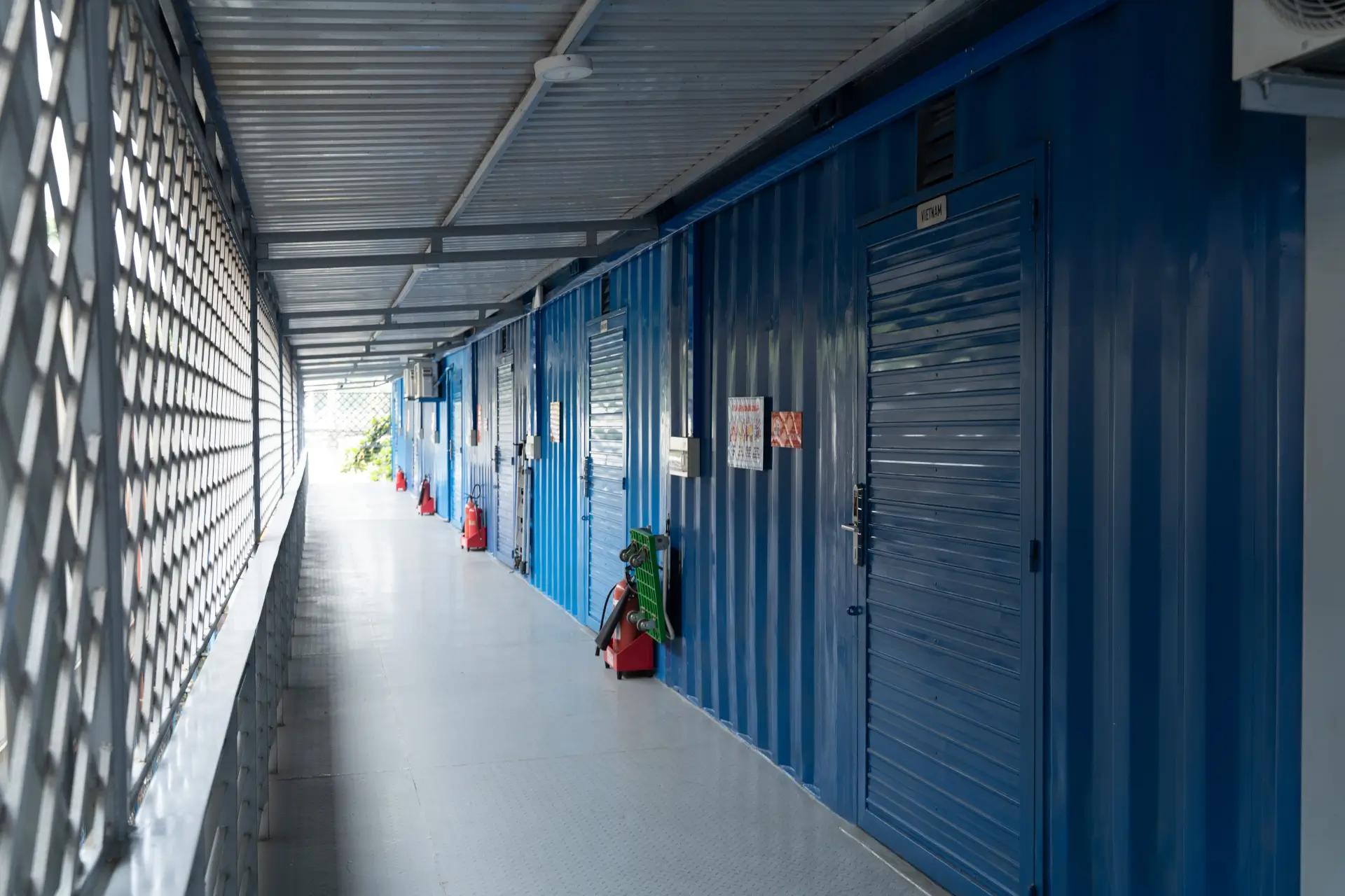 Covered walkway between the storage units