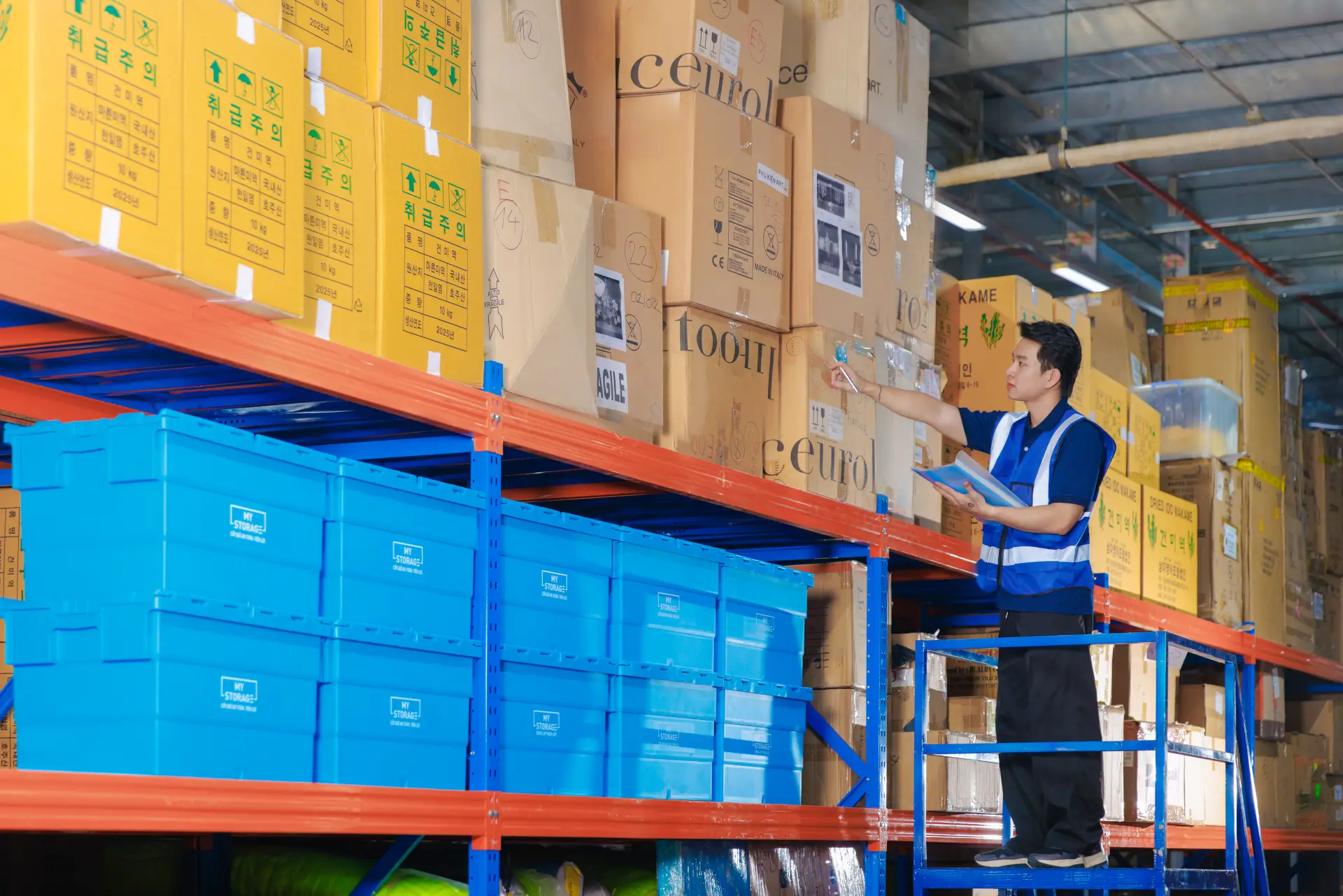 Warehouse worker inspecting inventory in the shelf space warehouse