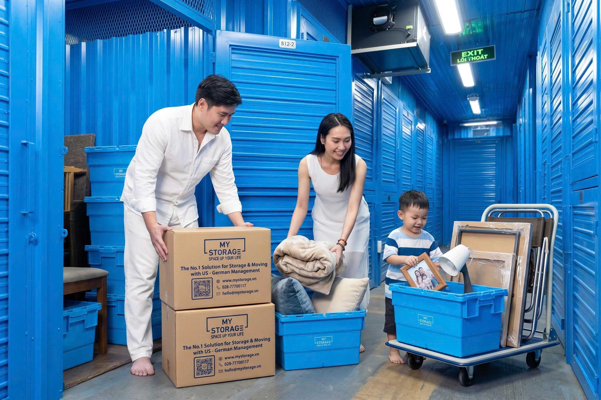 A family packing boxes into a MyStorage unit